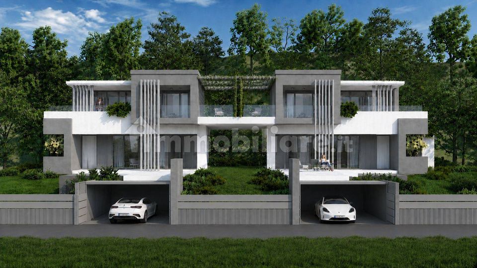 Villa bifamiliare in via Statale, Pescate